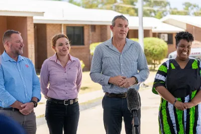 Minister for Corrections speaking to media outside the facility.